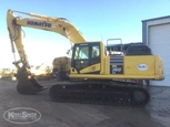 Side of used Komatsu Excavator in yard